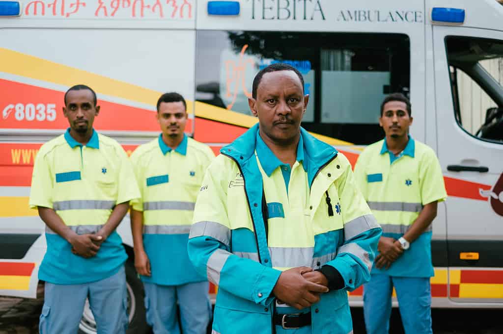 Four ambulette workers standby ready to respond to emergency calls in East Africa