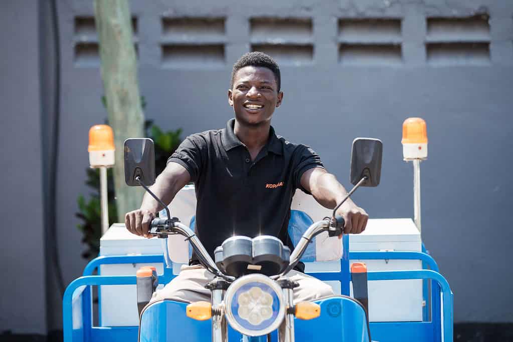 Man rides on cargo tricycle